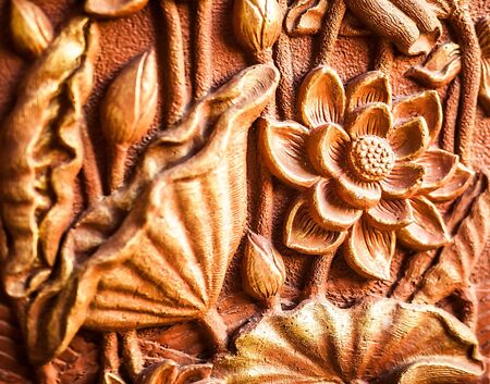 Traditional asian image cut from stone on a wall のeditorial素材