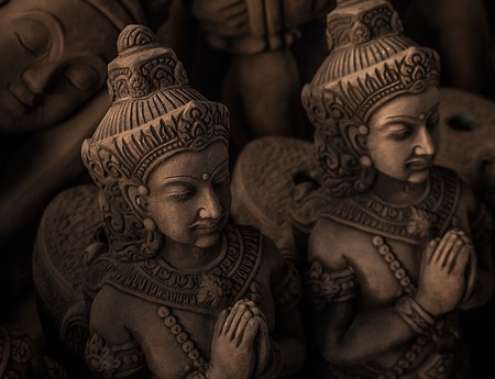 Ancient traditional figurines from stone の写真素材