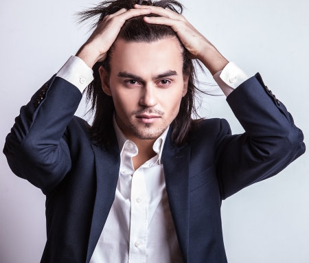 Portrait of handsome long-haired stylish man   の写真素材