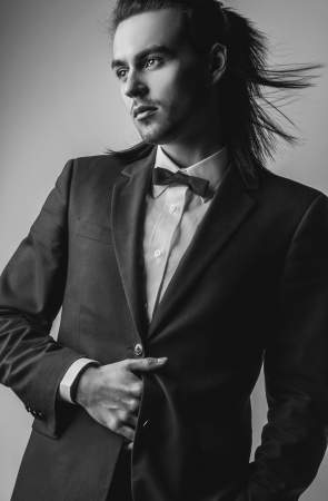 Portrait of handsome long-haired stylish man   の写真素材
