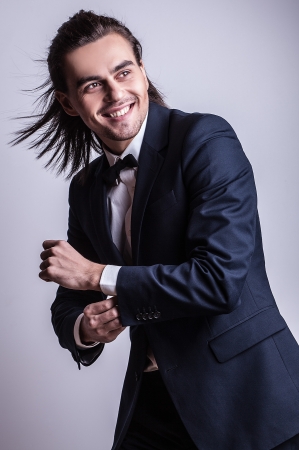 Portrait of handsome long-haired stylish man   の写真素材