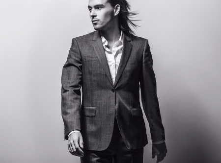 Portrait of handsome long-haired stylish man   の写真素材