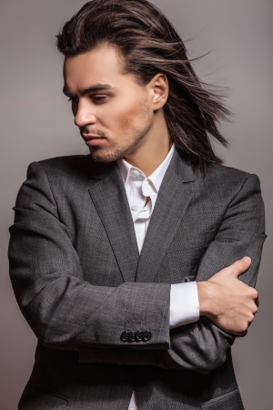 Portrait of handsome long-haired stylish man   の写真素材