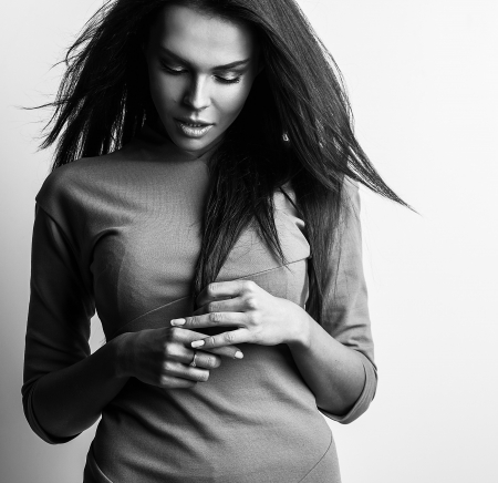 Young sensual   beauty woman in a fashionable dress   の写真素材