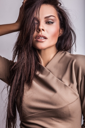 Young sensual   beauty woman in a fashionable dress   の写真素材