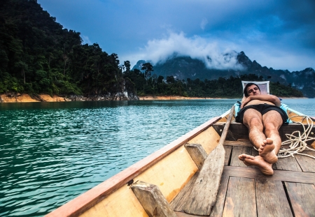 Landscape of tropical island with boat の写真素材