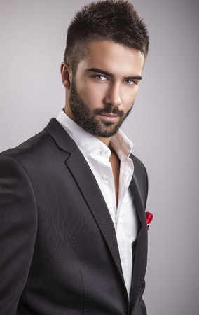 Elegant young handsome man  Studio fashion portrait   の写真素材