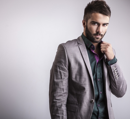 Elegant young handsome man  Studio fashion portrait