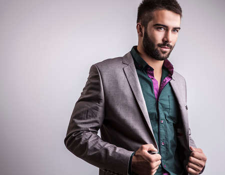 Elegant young handsome man  Studio fashion portrait   