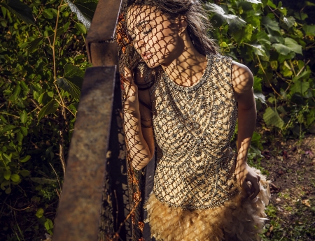 Dramatized image of sensual   attractive young woman in luxury dress   