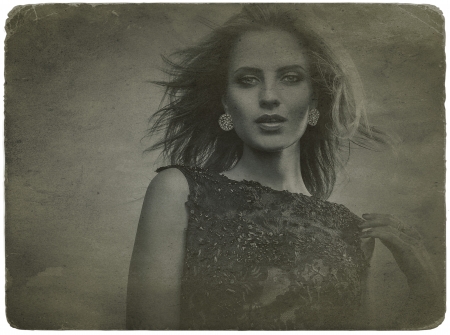 Retro styled grunge portrait of young beautiful woman の写真素材