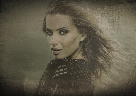 Retro styled grunge portrait of young beautiful woman 