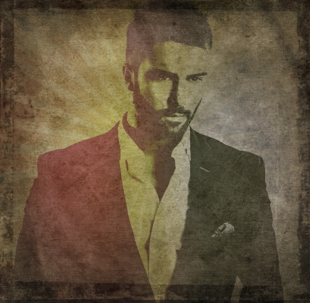 Retro styled grunge portrait of young attractive man の写真素材