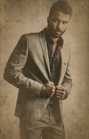 Retro styled grunge portrait of young attractive man の写真素材