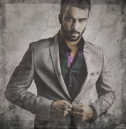 Retro styled grunge portrait of young attractive man の写真素材