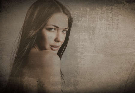 Retro styled grunge portrait of young beautiful woman 