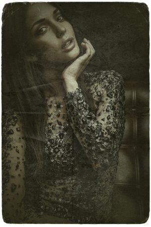 Retro styled grunge portrait of young beautiful woman の写真素材