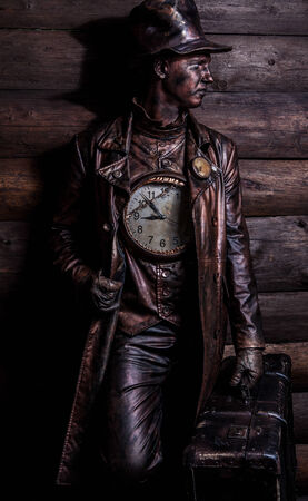 Image of watchmaker in bright fantasy stylization  Fairy tale art photo on grunge wooden background 