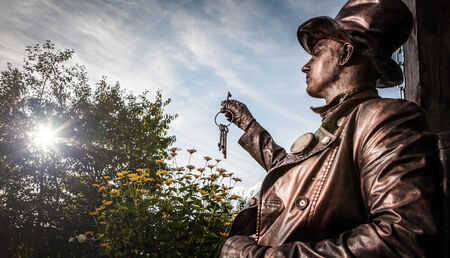 Image of watchmaker in bright fantasy stylization  Outdoor fairy tale art photo の写真素材