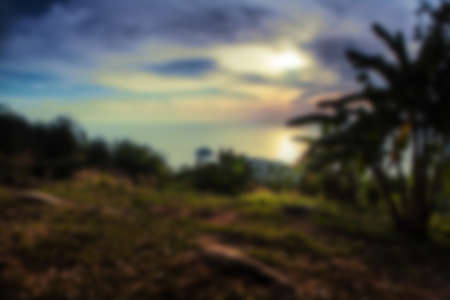 Beautiful blurred tropical view in defocus. Landscape photo with mountains  tropical trees.の写真素材