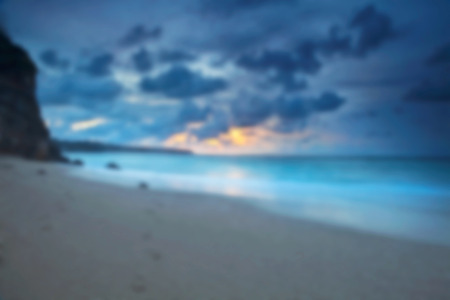 Beautiful blurred tropical view in defocus. Landscape photo with rocks and sea.の写真素材