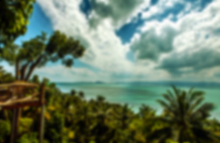 Beautiful blurred tropical view in defocus. Landscape photo with palm trees.の写真素材