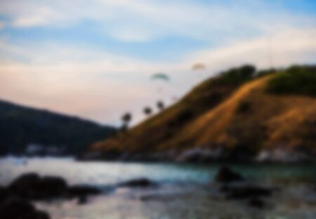 Beautiful blurred tropical view in defocus. Landscape photo with rocks and sea.の写真素材