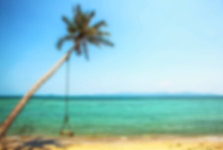 Beautiful blurred tropical view in defocus. Landscape photo with rocks and sea.の写真素材