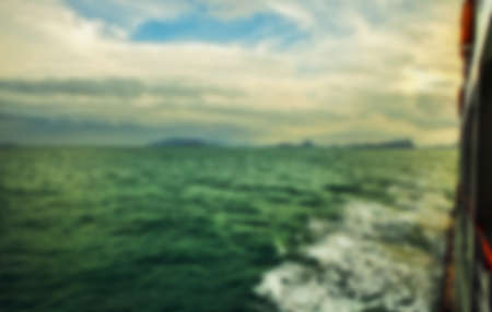 Beautiful blurred tropical view in defocus. Landscape photo with rocks and sea.の写真素材