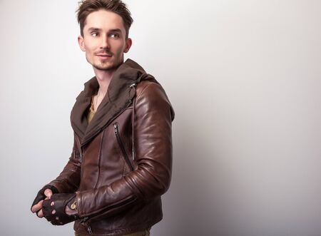 Attractive young man in leather jacketの写真素材