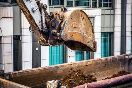 Ladle of excavator at construction site.