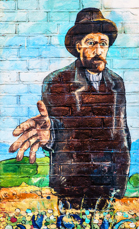 NETHERLANDS, AMSTERDAM - OCTOBER 25, 2015: Van Gogh drawing on street wall.のeditorial素材