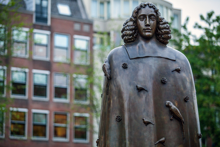 AMSTERDAM, NETHERLANDS - AUGUST 22: City sculpture from bronze of Spinoza on August 22, 2015 in Amsterdam.のeditorial素材