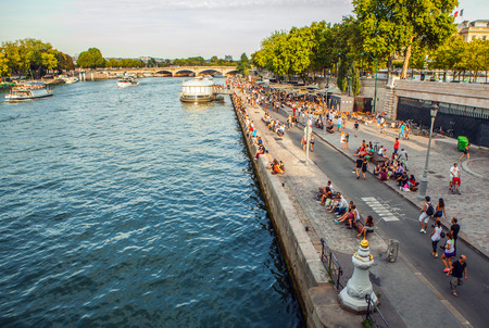 PARIS, FRANCE - AUGUST 28, 2015: Modern transport boat on Siena in summertime. Paris - France.のeditorial素材