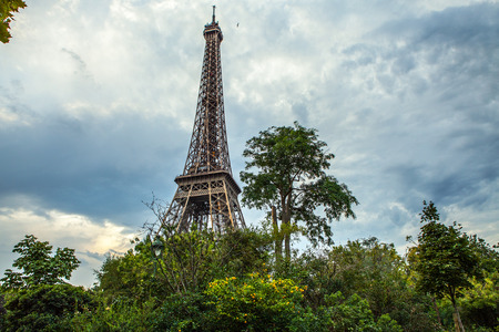 Eiffel tower in Paris against dramatic twilight sky at evening summer time.の写真素材