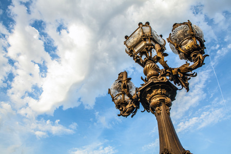 Bronze lamps on Alexander III Bridge.の写真素材