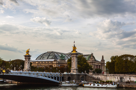 PARIS, FRANCE - AUGUST 30, 2015: Famous Alexandre III Bridge over river Seine in Paris, France.のeditorial素材