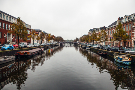 Boat on channel in Haarlem - Holland.のeditorial素材