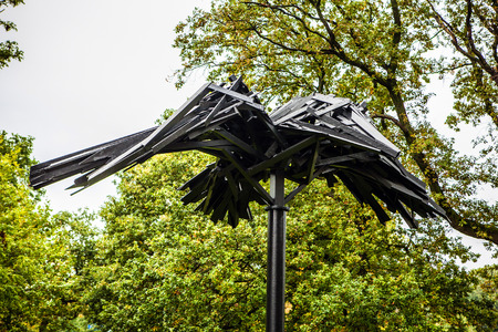 THE HAGUE, THE NETHERLANDS - OCTOBER 18, 2015: Contemporary art, bronze statue. Architecture of modern The Hague (Den Haag) city center, Netherlands.のeditorial素材