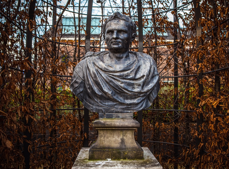 AMSTERDAM, NETHERLANDS - JANUARY 1, 2016: Ancient bronze statue in park of The Rijksmuseum...