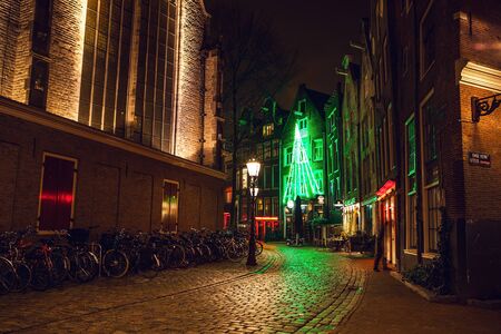 AMSTERDAM, NETHERLANDS - JANUARY 20, 2016: City sights of Amsterdam at night. General views of city landscape on January 20, 2016 in Amsterdam - Netherland.のeditorial素材
