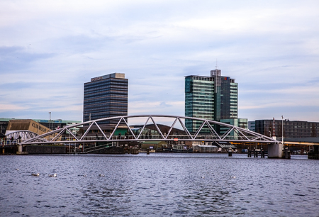 AMSTERDAM, NETHERLANDS - JANUARY 30, 2015: Beautiful views of streets, ancient buildings, boat, embankments of Amsterdam - also call "Venice in the North". Amsterdam - Netherland.のeditorial素材