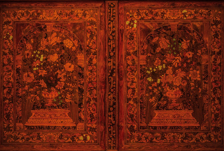 Old wooden ornaments as background.の写真素材