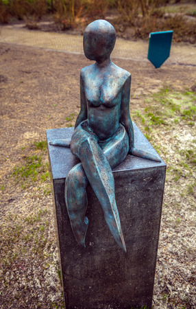 KEUKENHOF GARDEN, NETHERLANDS - MARCH 24: Statue in park. Keukenhof is the world's largest flower garden. Keukenhof Garden, Lisse, Netherlands - March 24, 2016.のeditorial素材