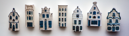 Traditional porcelain Dutch lodges on wall.の写真素材