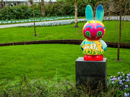KEUKENHOF GARDEN, NETHERLANDS - MARCH 24: Statue in park. Keukenhof is the world's largest flower garden. Keukenhof Garden, Lisse, Netherlands - March 24, 2016.のeditorial素材