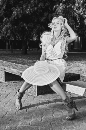 Black-white portrait of beautiful blonde woman outdoor.の写真素材