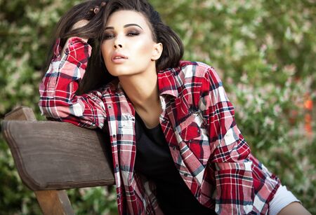 Outdoors portrait of beautiful young woman.の写真素材