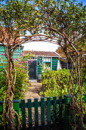 ZAANDAM, NETHERLANDS - AUGUST 14, 2016: Traditional residential Dutch buildings close-up. General landscape view of city building and traditional Dutch architecture. Zaandam - Netherlands.のeditorial素材