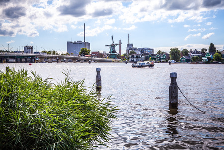 AMSTERDAM, NETHERLANDS - AUGUST 14, 2016: Famous Industrial buildings of Amsterdam city close-up. General landscape view of city building and traditional Dutch architecture. Amsterdam - Netherlands.のeditorial素材